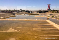 Santa Ana River showing efforts to retain runoff water to replenish ground water.