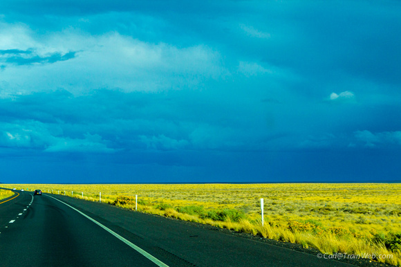 Dark clouds in the eastern sky in Arizona along I-40.