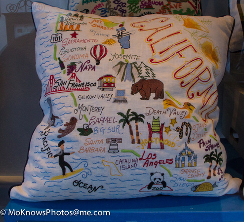 Pillow in window on Paseo Nuevo