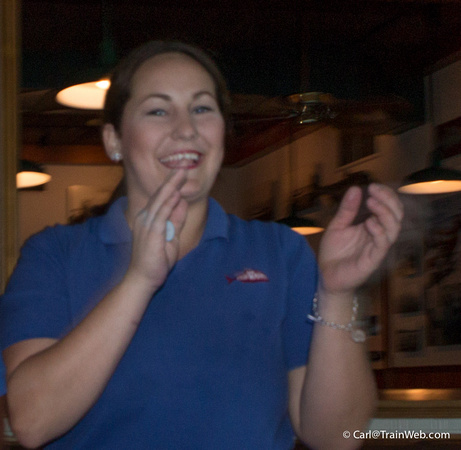 Emelee, our waitress, leads the singing of Happy Birthday for Matt.
